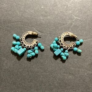 Cute little vintage, silver tone, and blue beard earrings